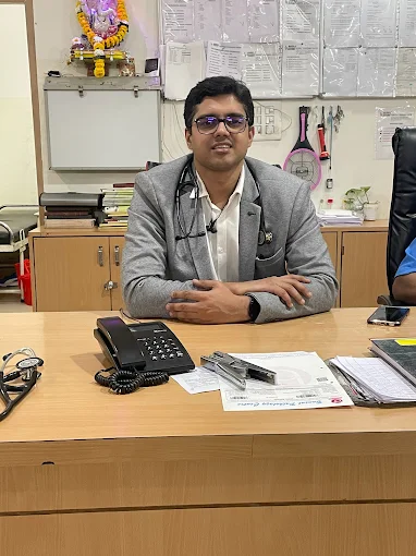 Dr Animesh Gupta cardiologist with stethoscope smiling