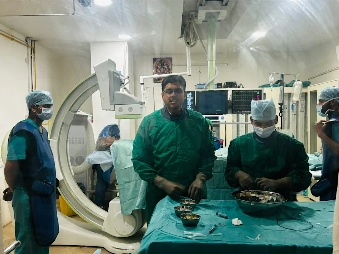 Heart surgery setup with doctors and advanced cath lab equipment