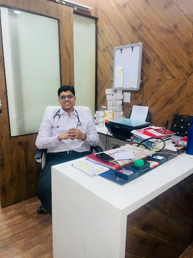 Dr Animesh Gupta cardiologist with stethoscope smiling