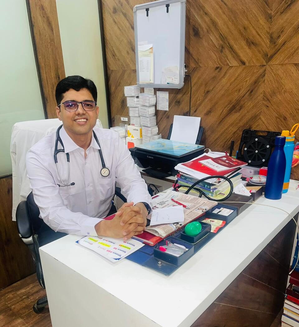 Dr Animesh Gupta cardiologist with stethoscope smiling